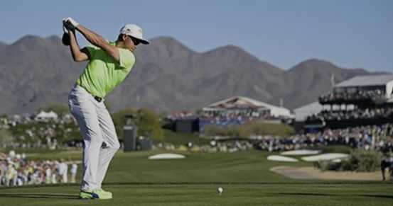 Golfer hitting a ball